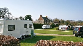Photo of tourers on the park