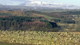 Caldbeck Fells, West of Penrith, viewed from Culgaith (© By Richard Harvey [CC BY-SA 2.0 uk (https://creativecommons.org/licenses/by-sa/2.0/uk/deed.en)], from Wikimedia Commons (original photo: https://commons.wikimedia.org/wiki/File:Caldbeck_Fells,_West_of_Penrith,_viewed_from_Culgaith.JPG))