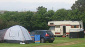 Photo of the tourers and camping at the park