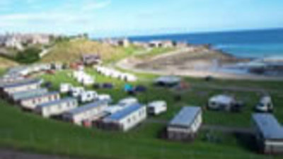 Aerial view of the caravan park with static holiday homes