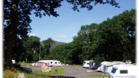 On the site - The entrance to the Llwyn yr Helm Caravan Park
