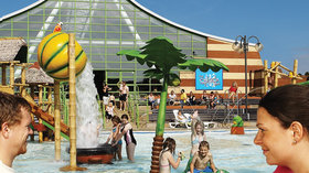 The Splash Zone at Vauxhall Holiday Park - The Splash Zone outdoor pool area and sunbathing terraces. A water wonderland where kids can swim and splash around. Parents can stretch out on the sunbathing terraces or enjoy a snack or drink by the pool.