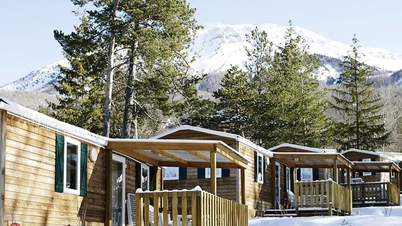 Winter Breaks in the French Alps - Log cabins with mountain views at L'Etoile Des Neiges