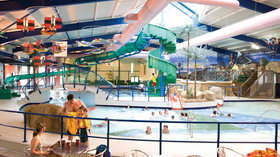 Splashland indoor swimming pool with water slides and chutes