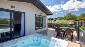 Cotswold Water Park holidays - Luxury hot tub lodge at Hoburne Cotswold Holiday Park, Cirencester