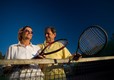 Elderly Couple Playing Tennis