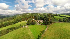 North Yorkshire holidays - Aerial view of the Barn at Rigg End and surrounding countryside