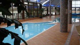 Picture of the heated indoor swimming pool at  Eryl Hall Caravan Park, Denbighshire, Wales, LL17 0EW - Relax in style. Our beautiful heated indoor swimming pool offers the ultimate for every generation. No matter what the weather, or time of year, the enticing water is perfect for having fun with the family or unwinding from the stress and strains of everyday life. Adult only swim session ensure a happy balance for all