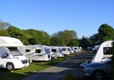 Motorhomes and touring caravans on the park