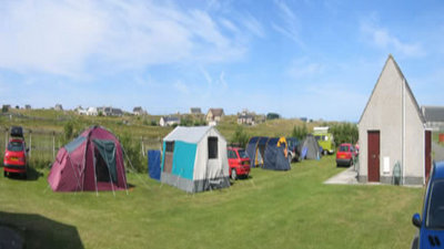 Tourers and tents on the caravan park